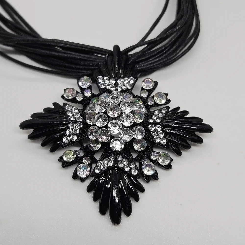 black multicord pendant with rhinestone pendant